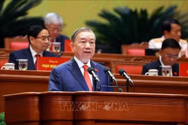 El secretario general del Partido Comunista de Vietnam, To Lam, presenta el Informe en el Congreso. Foto: VNA)