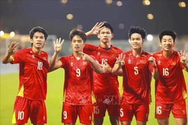 Jugadores vietnamitas celebran la victoria contra Corea del Sur. Foto: VNA