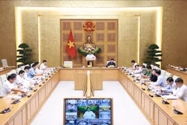 El primer ministro Pham Minh Chinh preside la reunión. (Foto: VNA)