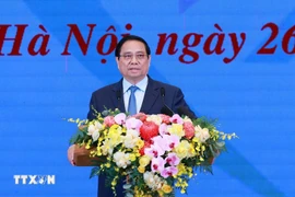 El primer ministro Pham Minh Chinh habla en la conferencia de balance del programa "Todo el país se une para eliminar viviendas precarias" (Foto: VNA)
