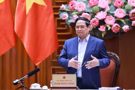 El primer ministro Pham Minh Chinh habla en la reunión. (Foto: VNA)