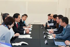 Durante la reunión sobre el CPTPP entre los dos ministros de Vietnam y Japón (Foto: VNA)