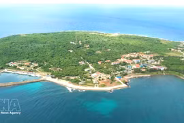 Con Co, de “isla de acero” a “joya verde” en el Mar del Este