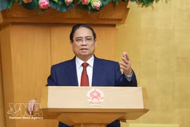 El primer ministro de Vietnam, Pham Minh Chinh, habla en la conferencia. (Foto: VNA)