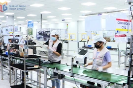 Actividades de producción en la empresa Bumjin Electronics Vina.