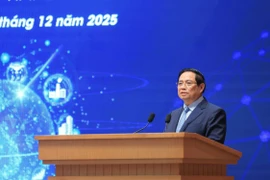El primer ministro Pham Minh Chinh habla en el III Foro Nacional sobre el Desarrollo de la Economía Digital y la Sociedad Digital. (Foto: VNA)