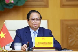 El primer ministro Pham Minh Chinh habla en la cumbre. (Foto: VNA)