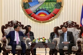 Firman Vietnam y Laos acuerdo de cooperación partidista