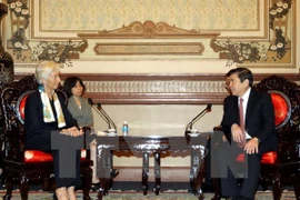 La directora general del Fondo Monetario Internacional, Christine Lagarde, y el presidente del Comité Popular de Ciudad Ho Chi Minh, Nguyen Thanh Phong (Fuente: VNA)