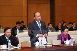 Parlamento vietnamita escruta informe de trabajo de gobierno y premier