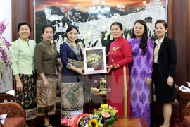 Uniones de Mujeres de Vietnam y Laos refuerzan lazos de cooperación