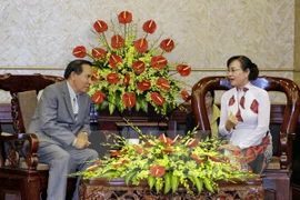 Ciudad Ho Chi Minh y Vientiane fortalecen cooperación entre organizaciones de masas