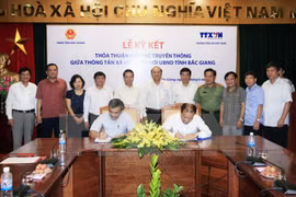 Fomentan cooperación en comunicación entre VNA y Bac Giang