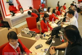Aplican tecnologías 4.0 en sector bancario de Vietnam