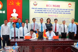 Organizaciones de masas de Vietnam y Laos coordinan divulgación sobre protección de frontera común