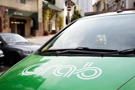 Toyota invierte mil millones de dólares en Grab, líder de transporte compartido en Asia