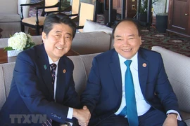 Intensa jornada del premier Nguyen Xuan Phuc en la cumbre ampliada del grupo G7 