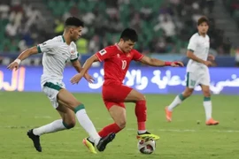 Una jugada en el partido entre Vietnam e Iraq. (Foto: VNA)