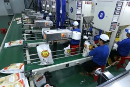 Expertos extranjeros pronostican aumento de precios del arroz vietnamita 