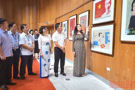 Resaltan valores de pinturas de propaganda en exposición en Quang Ninh