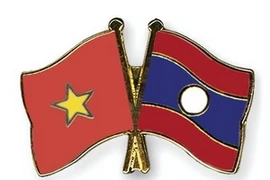 Mitin en Vientiane honra gran amistad, solidaridad especial y cooperación integral Vietnam- Laos