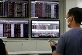 Divulgan informe sobre mercado financiero de Vietnam en 2021 y 2022