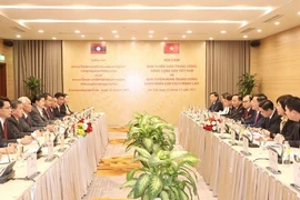 Robustecen cooperación entre Comisiones de Partidos de Vietnam y Laos