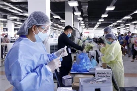 Impulsa Laos vacunación contra el COVID-19 a menores