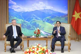Primer ministro de Vietnam recibe al secretario general de la OCDE