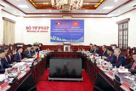 Ministerios de Justicia de Vietnam y Laos mejoran eficiencia de cooperación 