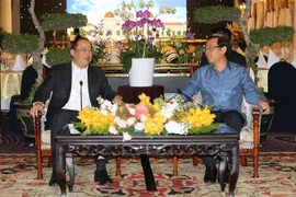 Ciudad Ho Chi Minh promete crear condiciones favorables para inversores laosianos