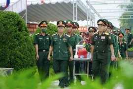 Realizan en Vietnam acto de entierro de soldados caídos en Laos