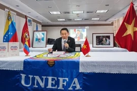 Coloquio en Venezuela sobre práctica de innovación y desarrollo socialista de Vietnam 