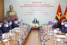 Fomentan cooperación entre comisiones partidistas de Vietnam y Laos
