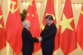 Efectúan en China acto de recibimiento al secretario general de PCV