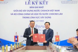 Vietnam y Laos firman acuerdo de cooperación en sector de construcción