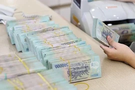 Transacciones por valor de 400 millones de VND deben informarse al Banco Estatal de Vietnam a partir de hoy