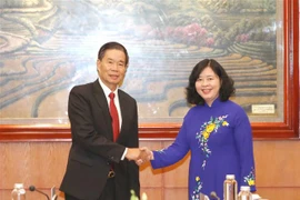 Vietnam y Laos intensifican intercambio de experiencias sobre movilización masiva