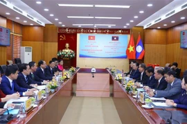 Vietnam y Laos comparten experiencias en gestión de asuntos religiosos