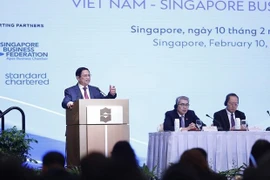 Primer ministro asiste al Foro empresarial Vietnam-Singapur