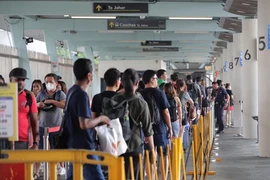 Singapurenses exentos del proceso de tarjeta de llegada digital de Malasia