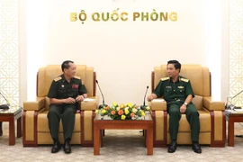 Ministerios de Defensa de Vietnam y Laos agilizan lazos en información