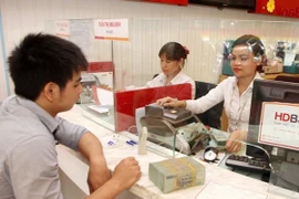 Sector bancario de Vietnam por respaldar a comunidad empresarial ante impactos de COVID-19 