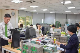Impulsan el pago electrónico para impedir la propagación del COVID-19 en Vietnam 