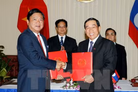 Firman Vietnam y Laos acuerdo de cooperación en transporte
