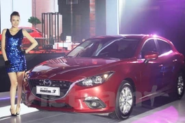 En Vietnam mayor exposición de autos importados