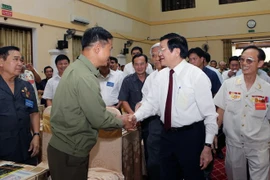 El presidente vietnamita, Truong Tan Sang, reunió con excombatientes en Nghe An (Fuente: VNA)