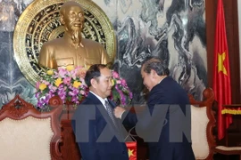 Funcionarios judiciales de Laos y Cambodia reciben distinción vietnami