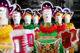 Muñeco de papel, juguete tradicional del Festival de Medio Otoño