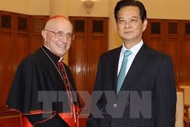 El primer ministro Nguyen Tan Dung y el cardenal Fernando Filoni (Fuente: VNA)